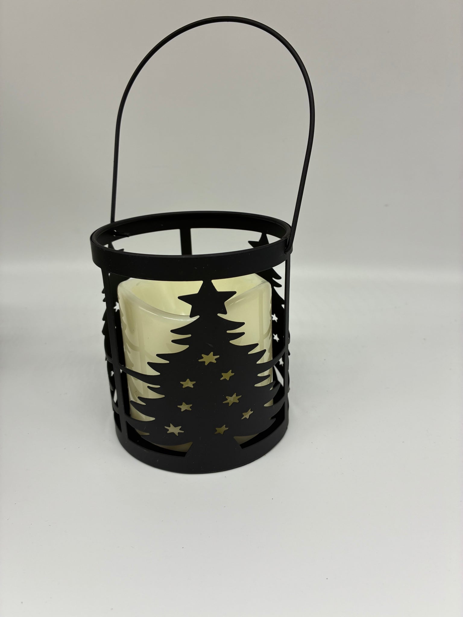 Lighted metal holiday lantern with timer
