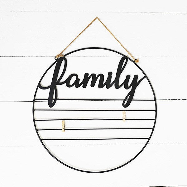 Family circle with clips to hang photos.